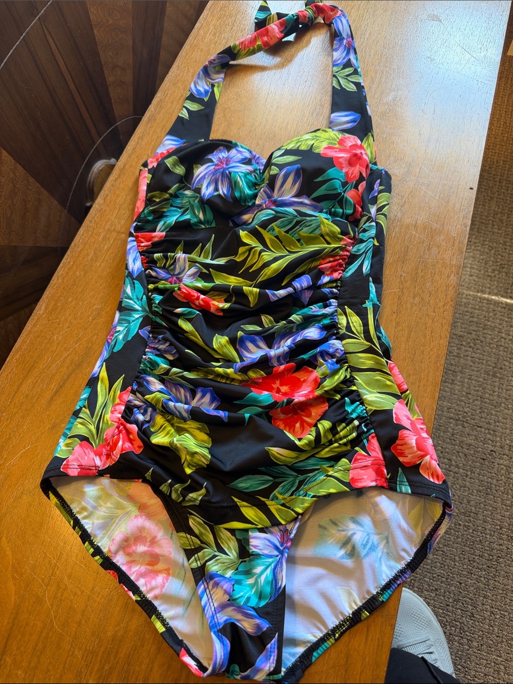 Tropical Floral Halter One-Piece Swimsuit in Black background and floral print